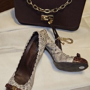 Gently loved TORY BURCH  snakeskin pumps 9.